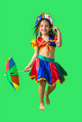 Brazilian child, girl dressed in carnival outfit, dancing with frevo umbrella. Little girl, brazilian, with frevo clothes, dancing frevo.	Carnival costume. Little brunette girl with curly hair dancing