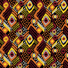 Ikat geometric folklore ornament with tribal ethnic seamless striped pattern Aztec style. oriental...
