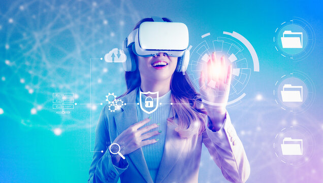 Asian businesswoman exploring virtual reality screen with VR headset to manage online data. Business, technology, internet iot and networking concept. - Powered by Adobe