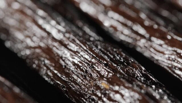 Tracking shot along Vanilla beans texture, Extreme macro shot, Rack focus