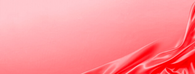 ドレープのある赤い布の背景テクスチャー
