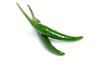Fresh green chilies over white background.