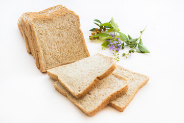 slice of bread bakery dessert with flowers arrangement flat lay style on background white 