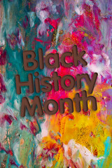 Naklejka premium Abstract Natural Luxury art, fluid painting with Black History Month text, alcohol ink technique. Image incorporates the swirls of marble granite.