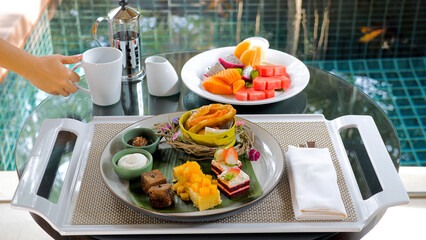 Breakfast in Modern Hotel with a Table Full of Various Food