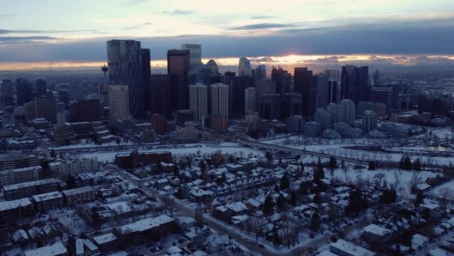 Flying a drone in the heart of Calgary during a winter sunset