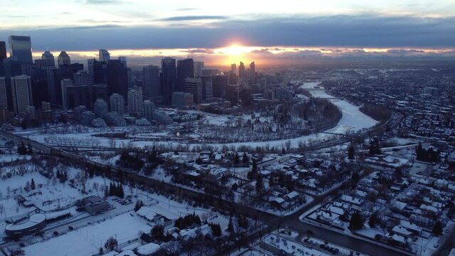 Exploring Calgary's downtown from above with a drone during a winter sunset