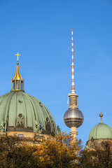 The cupola of the cathedral and the famous TV Tower in Berlin