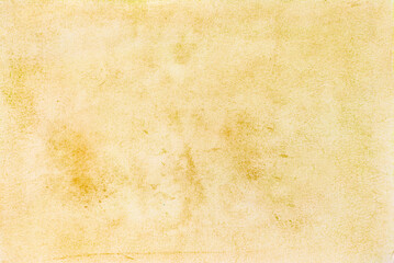 Abstract yellow watercolor and paper texture background.