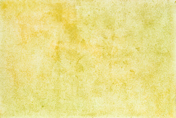 Abstract green and yellow watercolor and paper texture background.