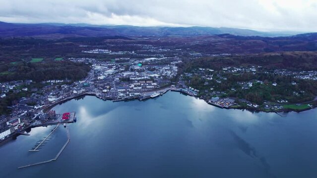 Gloomy harbour Oban resort town Scotland aerial 