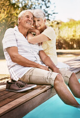 Fototapeta na wymiar Senior couple, relax and smile for pool, love and summer vacation, bonding or quality time together in the outdoors. Happy elderly man and woman relaxing and hugging with feet in water by a poolside