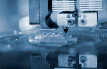 3d printer printing a model close-up. The process of printing a model on a 3D printer made of plastic.
