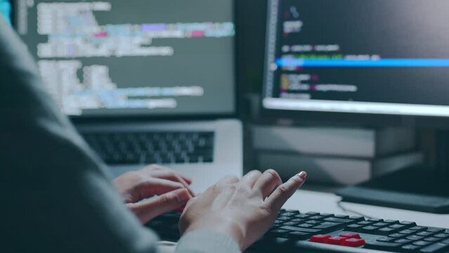 Closeup hand of developer programmer, software engineer, IT support, typing on computer keyboard