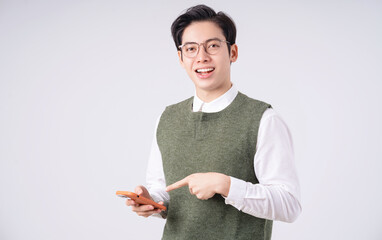 Image of young Asian man on white background