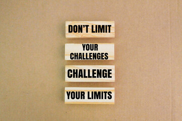 stick with the words Don't Limit Your Challenges, Challenge Your Limits. the concept of self-motivation. Motivational and inspirational