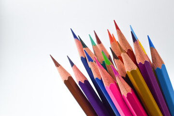 Close-up of Colour pencils isolated on white background.