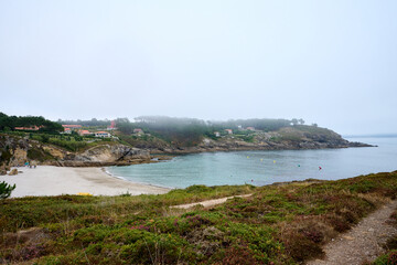 Obraz premium Beach from a Galician town of the Cantabrico Sea on a cloudy day