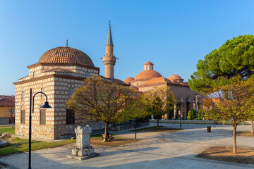 Iznik city museum and Seyh Kutbuddin and its son tomb made of red bricks wall at sunny day. Iznik...