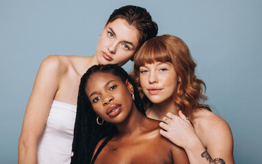 Fototapeta premium Women with different skin tones standing together