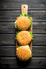 Beef burgers on the stand.