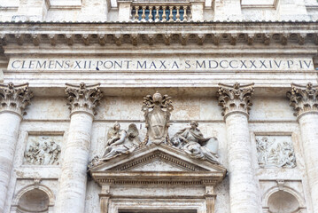 A fragment of the building, the cathedral. Old church, statue, sculpture, statue, pillar, religion.