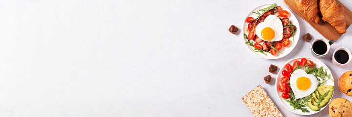 Couple breakfast border on Valentines Day on gray background, top view