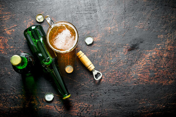 Glass of beer and a bottle.