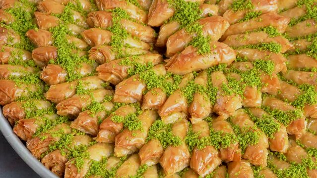 Traditional turkish baklava pistachio pastry. Dilberdudagi, ozel kesim baklava, cikolatali baklava, fistikli baklava, katmer, fistikli kadayif, kattafi, fistik sarma, soguk baklava, midye baklava, cev