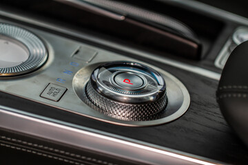 Car driving mode switch. Drive mode selector button.