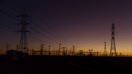 Fototapeta premium Electric substation at sunset