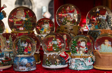 Close up of christmas snow globes at the christkindlmarkt of Brunico in Alto Adige, Italy