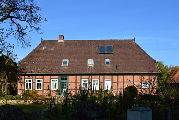 Fototapeta na wymiar Historical Building in Autumn in the Village Düshorn, Walsrode, Lower Saxony