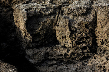texture of the stone. the surface of basalt.