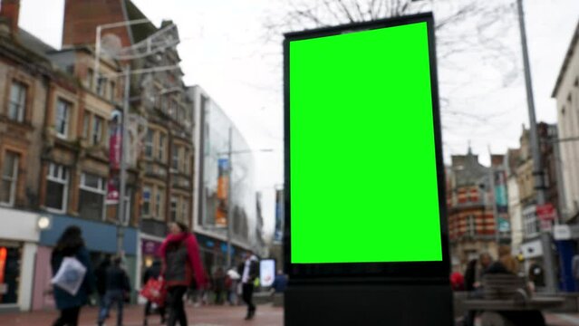 4K Large Green Screen Advertising Board - City Street scene showing high street and transport hub with billboard for targeted ads towards commuters and shoppers