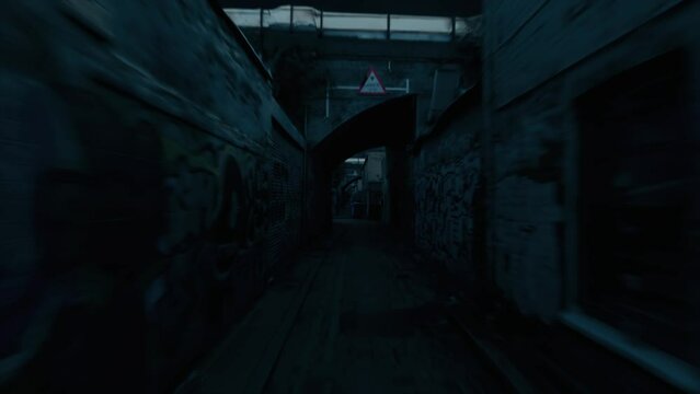 Rushing back down a dark alley. Night city. Game. Graffiti on the walls. Crime District. 3d animation of seamless loop