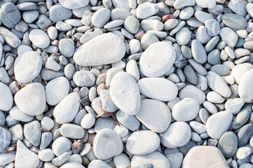 white stones on the beach close-up, texture