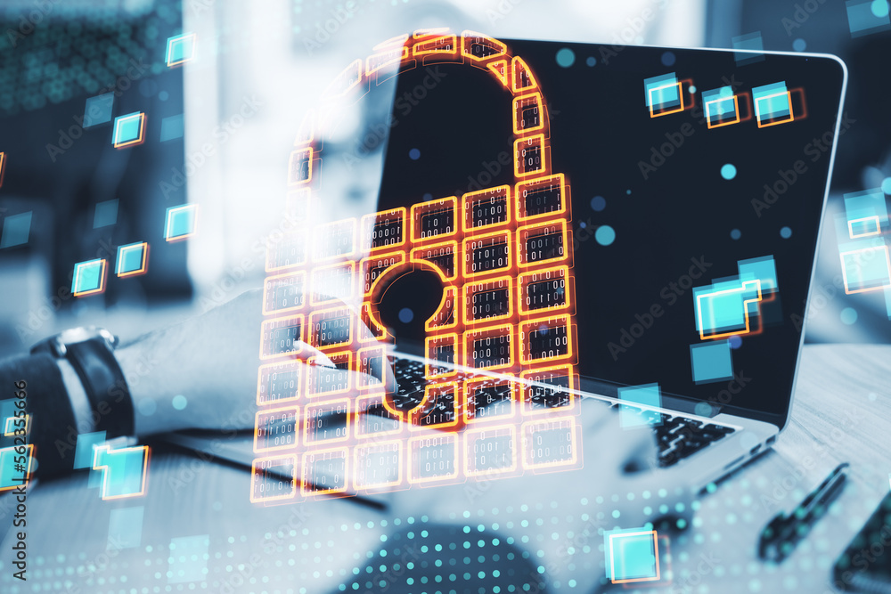 Aufkleber close up of businessman hands using laptop at desktop with glowing padlock safety hologram on blurry