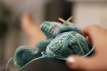 cosy evening with knitting, shallow depth of field