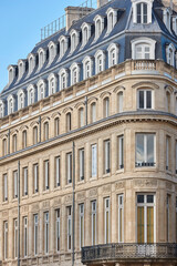 Fototapeta na wymiar Classic urban building facade in Bordeaux cityscape. Aquitaine, France