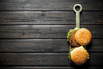 Burgers with a cutlet of juicy beef,vegetables and cheese.