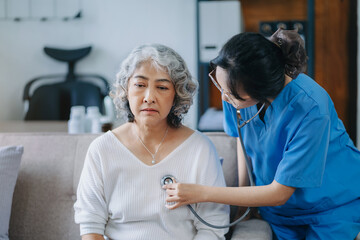 Doctor with stethoscope examining patient with examination, healthcare and medical concept.