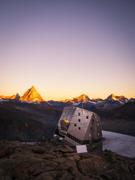 Orange sun on the Matterhorn mountain range