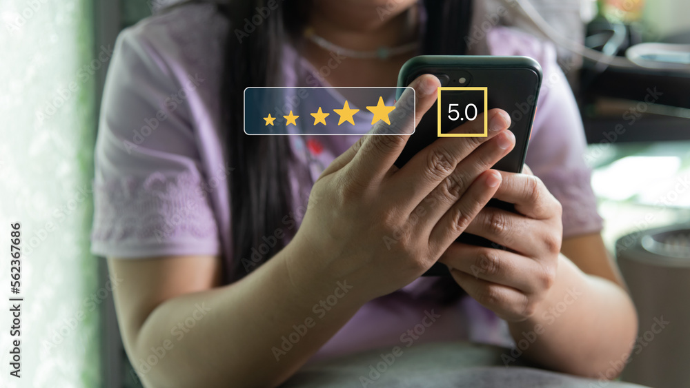 Aufkleber customer service satisfaction evaluation concept. man using smartphone and touching on screen with g