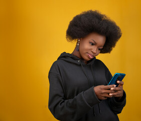 Black girl holding a mobile phone