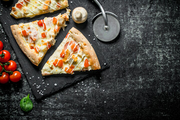 Slices of freshly cooked chicken pizza.