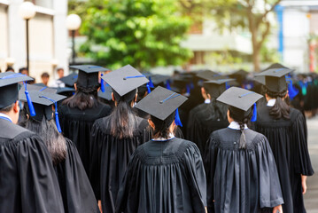 Back side view a group higher education graduation of graduates during commencement. Congratulation in University concept, Education concept.