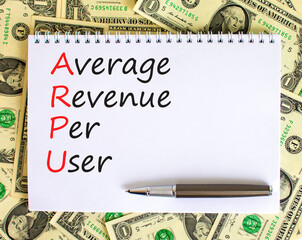 ARPU average revenue per user symbol. Concept words ARPU average revenue per user on white note on beautiful white background. Business ARPU average revenue per user concept. Copy space.