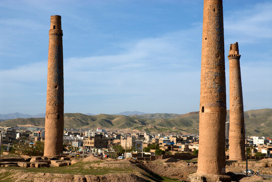 Three tall minarets, once part of a madrassa that was built in the 15th century by the last of the Timurid rulers, tower over a