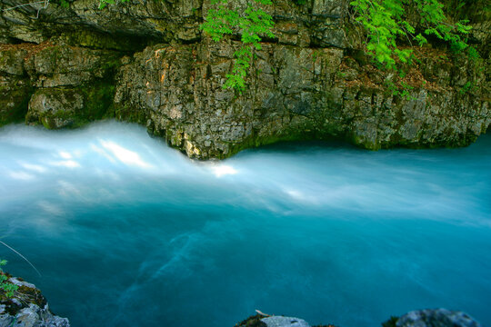 Arazas River surrounded abundant greenery in the National Park of Ordesa and Monte Perdido